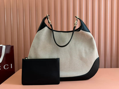 BODY MEDIUM SHOULDER BAD 49 IN NATURAL CANVAS AND BLACK CALFSKIN GOLD HARDWARE