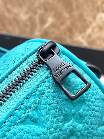 KEEPALL BANDOULI¨¨RE 25 IN TURQUOISE BLUE MONOGRAM EMBOSSED CALFSKIN