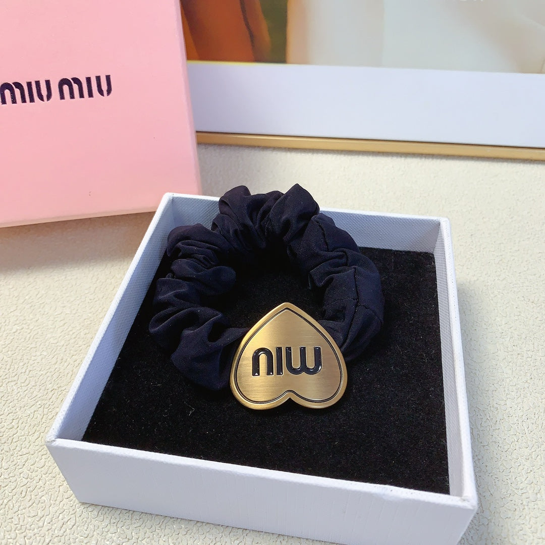 SCRUNCHIE WITH HEART ICON IN BLACK SPANDEX FABRIC 397152
