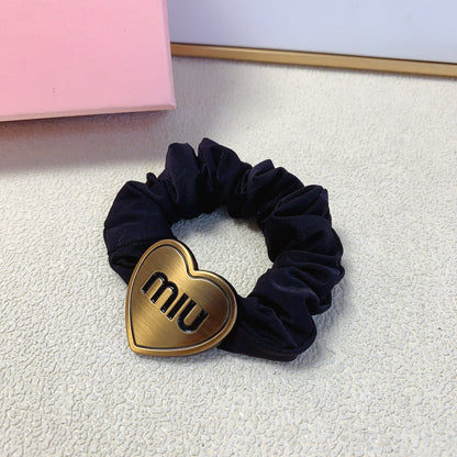 SCRUNCHIE WITH HEART ICON IN BLACK SPANDEX FABRIC 397152