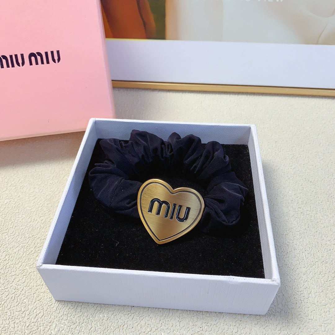 SCRUNCHIE WITH HEART ICON IN BLACK SPANDEX FABRIC 397152